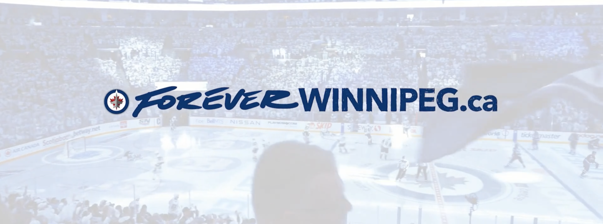 A home game of a Jets Hockey game in an area is full of Jets Fans. The title overlays the image, the text reading: "Foreverwinnipeg.ca"